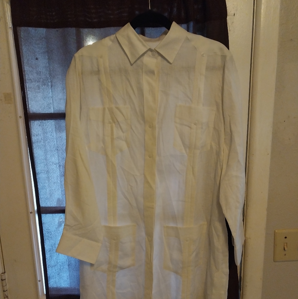 This is a women's Mexican wedding dress. 100% linen